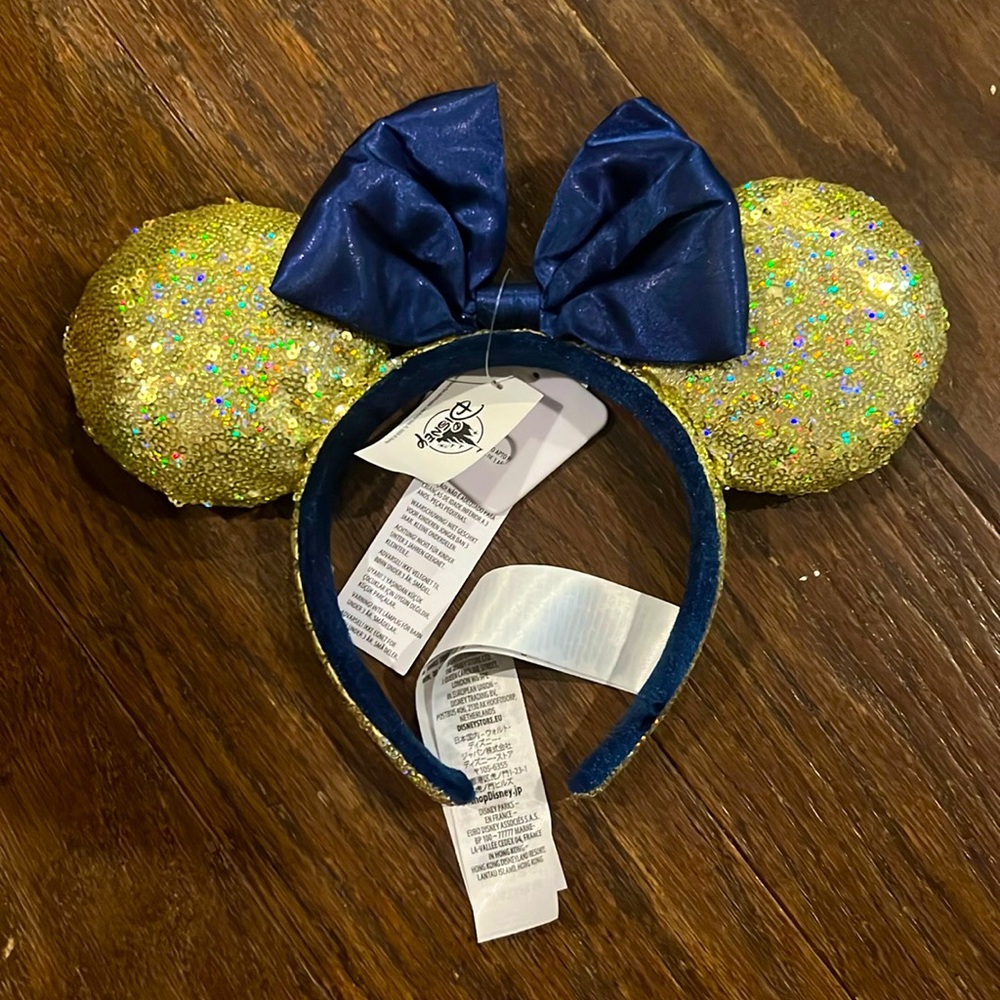New $30 Disney Mickey gold sequin ears with dark blue bow